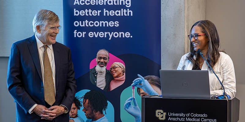 CU Anschutz Chancellor Don Elliman and Kia Washington, MD, principal investigator of the THEIA project, at the Dec. 2 press conference at the CU Anschutz Medical Campus. 