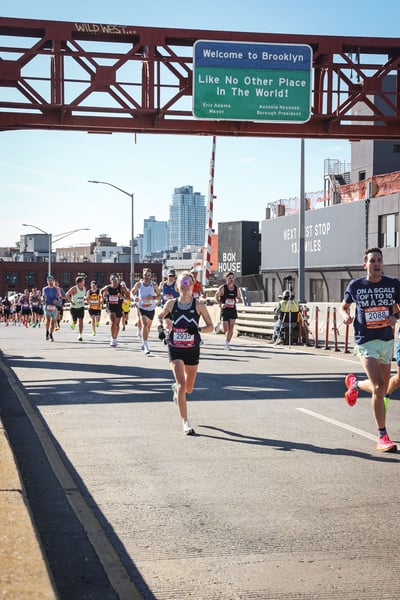 Aubrey Armento, MD, running a marathon.