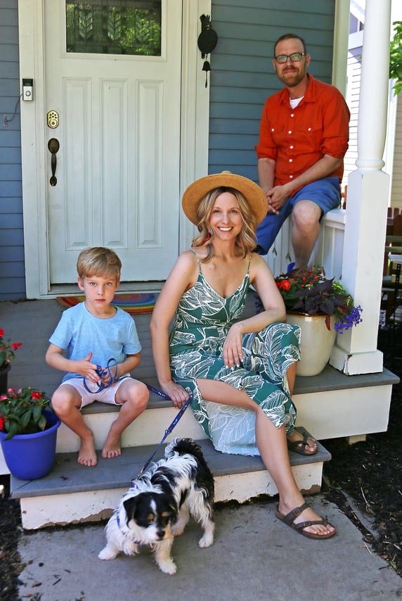 family on porch vert 2