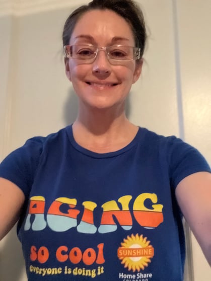 Cari Levy, MD, PhD, wearing a shirt that says, "Aging, so cool everyone is doing it."