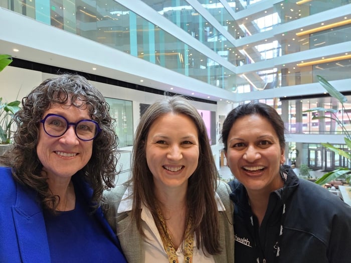 Three CU Anschutz Department of Medicine leaders smile together for a selfie.