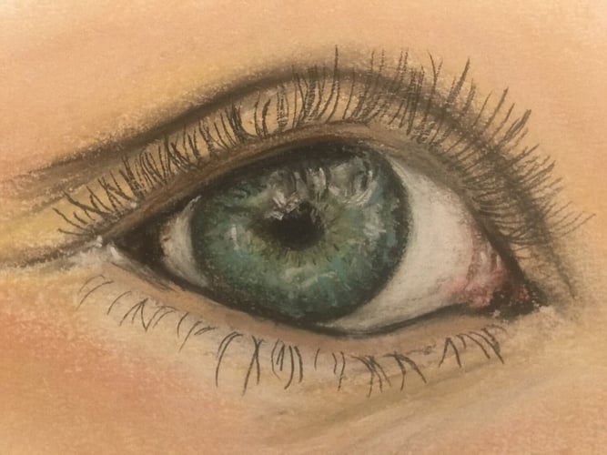 An oil pastel drawing of an eyeball.