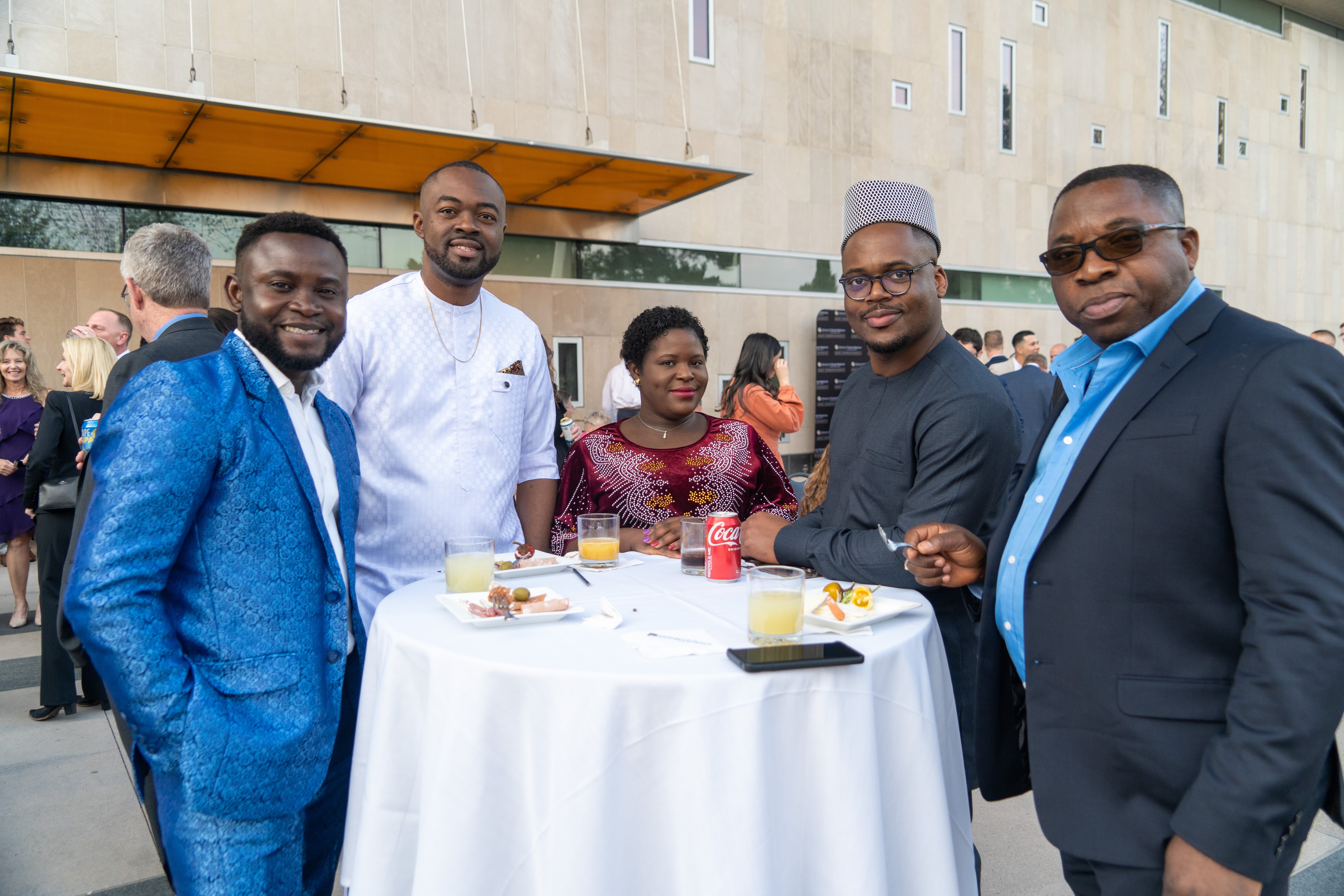 five people at cocktail hour