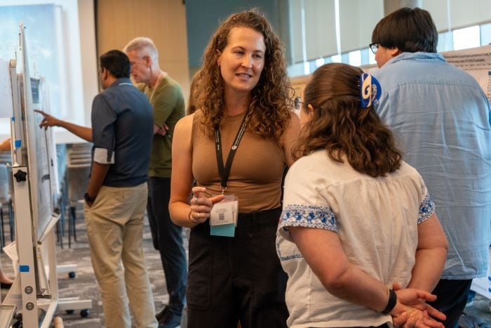 Postdoc post session people speaking