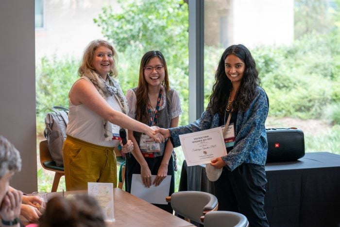 Poster session awardee receiving award