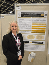 Melissa Palmer in front of poster