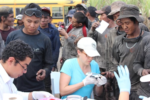 Lindsay Krisher, DrPH, and team member, conducting biotesting on sugar cane workers.