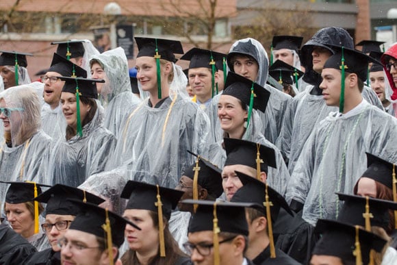 Graduates brave the rain during the CU Anschutz commencement ceremony.