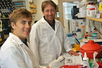 Neil Box performing research in a lab on the CU Anschutz Medical Campus