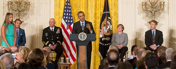 Comstock and President Barack Obama at the Healthy Kids and Safe Sports Concussion Summit
