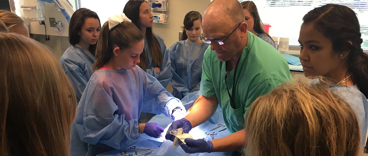 Participants of the ‘Exploring Healthcare Careers for High School-Aged Girls’ event, hosted by the CWHR, practice suturing techniques at the Center for Surgical Innovation