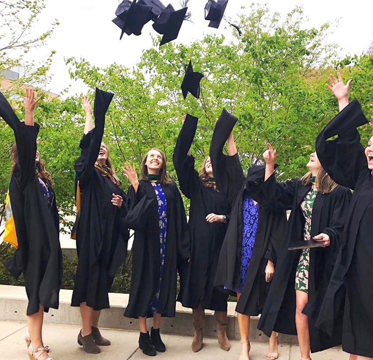 Graduates toss caps 2019