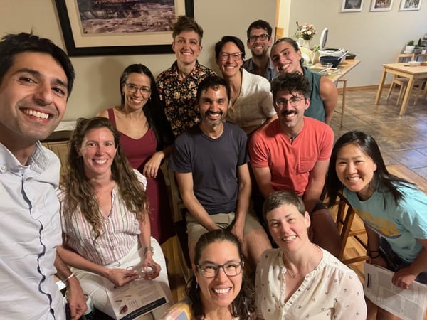 Avash Kalra, MD, smiles with a group of medical providers.