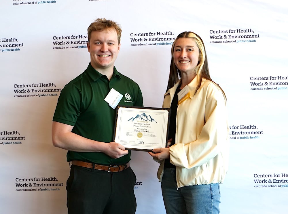 Thomas Minchak wins IH poster award.