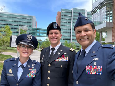 COMBAT leaders pose for a photo in military uniforms.