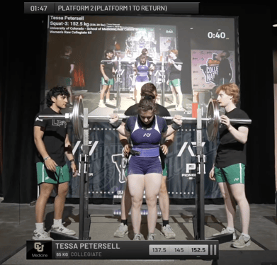 Tessa Petersell prepares for a squat at a powerlifting meet.