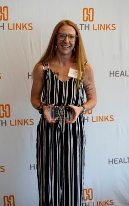 Absolute Caulking & Waterproofing accepting award.