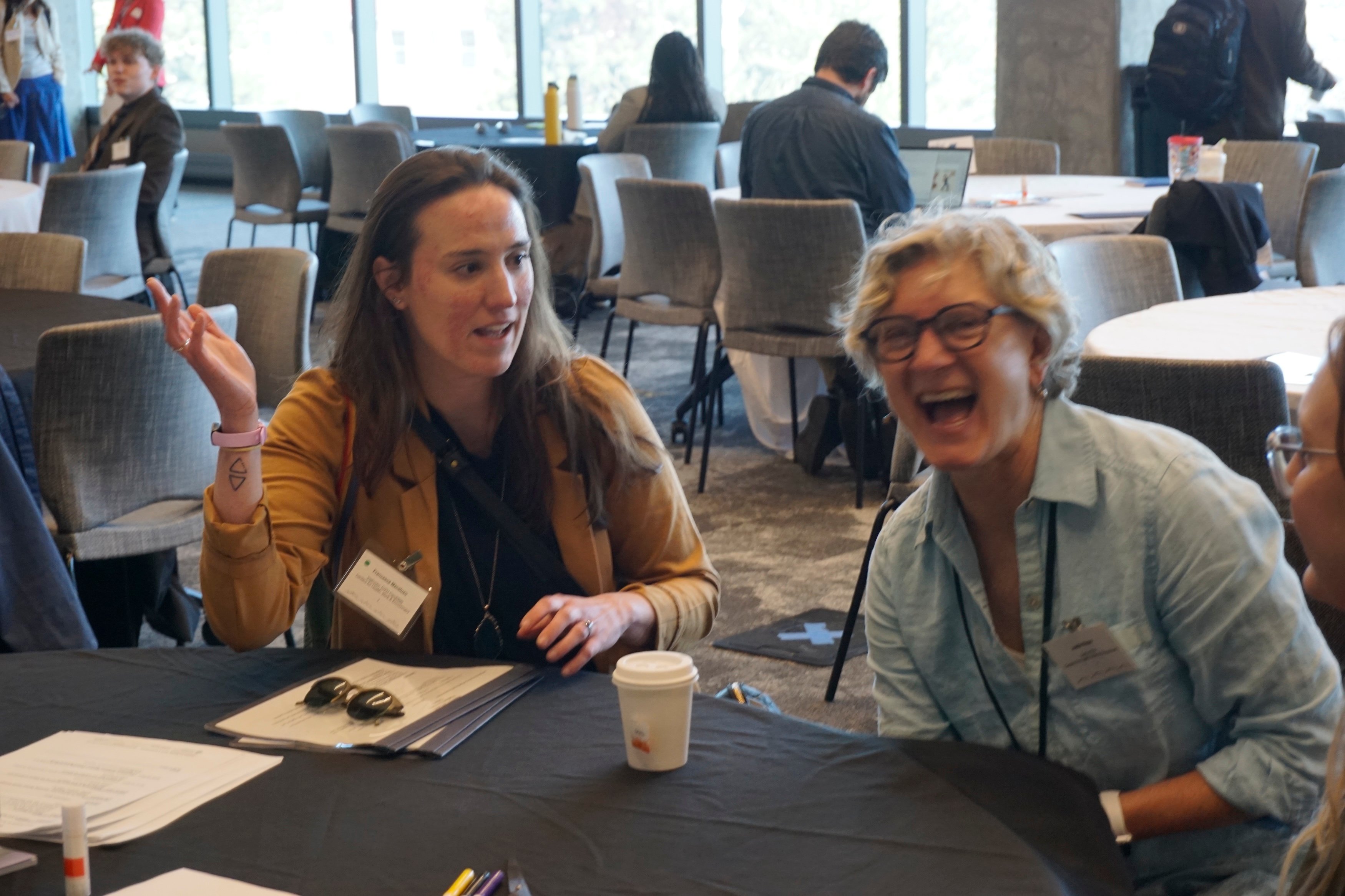 CHWE team members laughing.