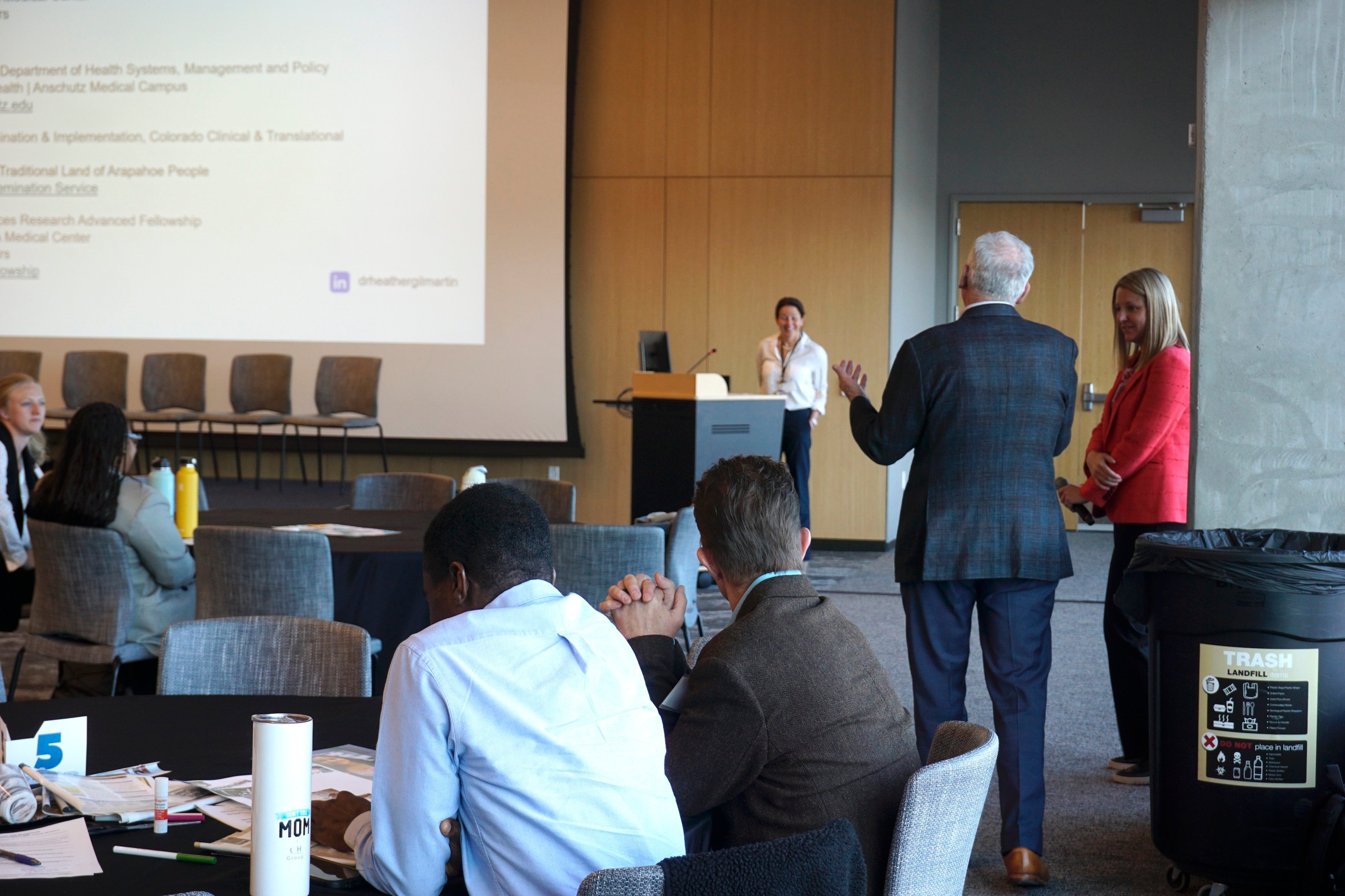 Director of CHWE, Lee Newman asks keynote speaker Heather Gilmartin a question. 