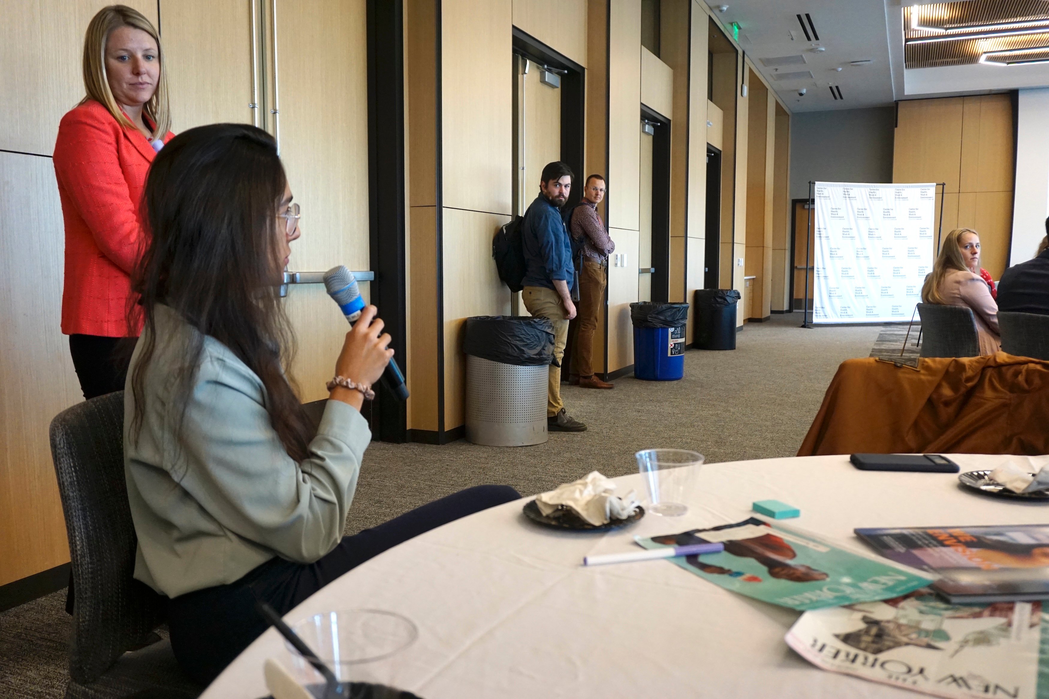 Attendee asking the presenter a question.