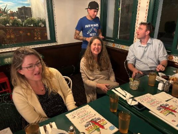 More palliative care education community members at a dining table