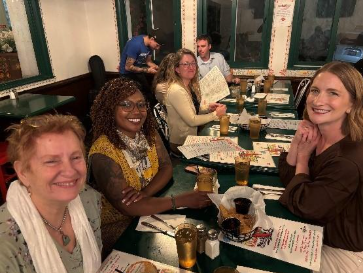 Palliative care education community members at dinner in San Diego