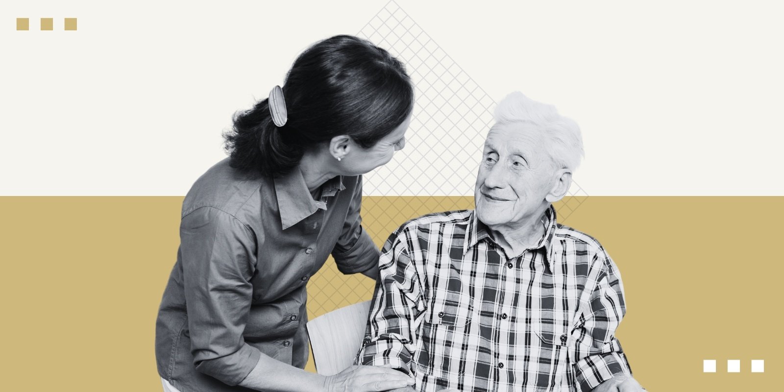 An elderly individual sits next to a caretaker holding them by the arm. 