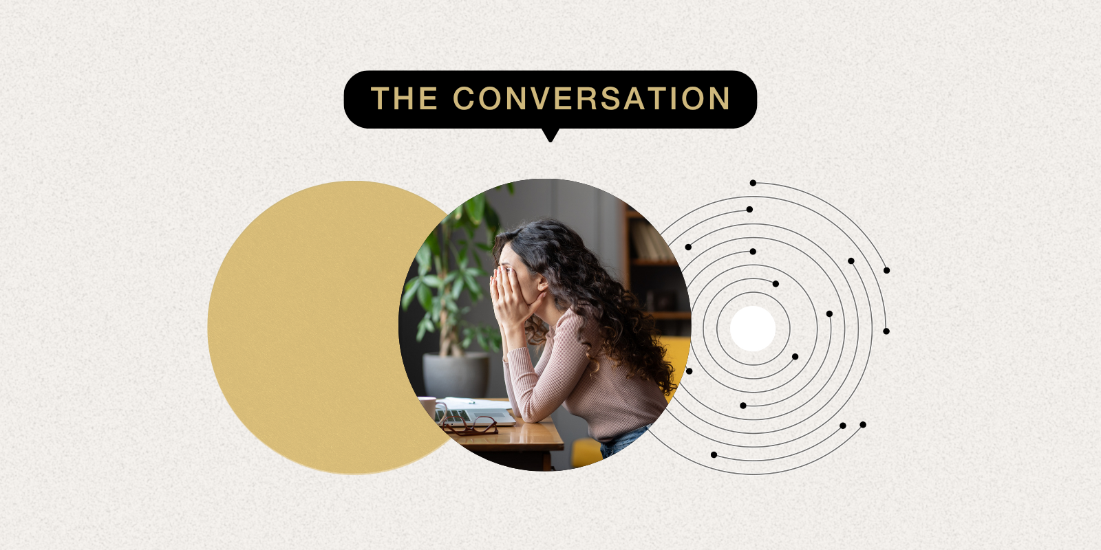 Photo of a woman looking overwhelmed with hands on her face.