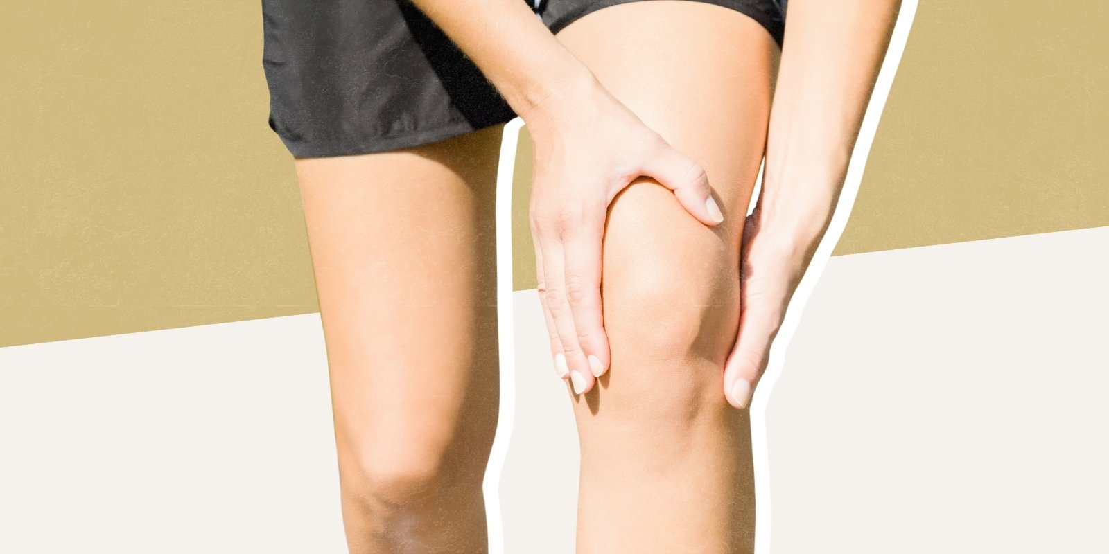 A person in pain holding their knee.