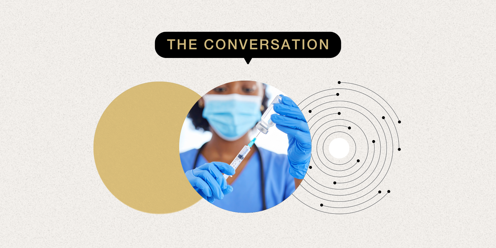 Photo of medical professional holding a syringe of a vaccine 