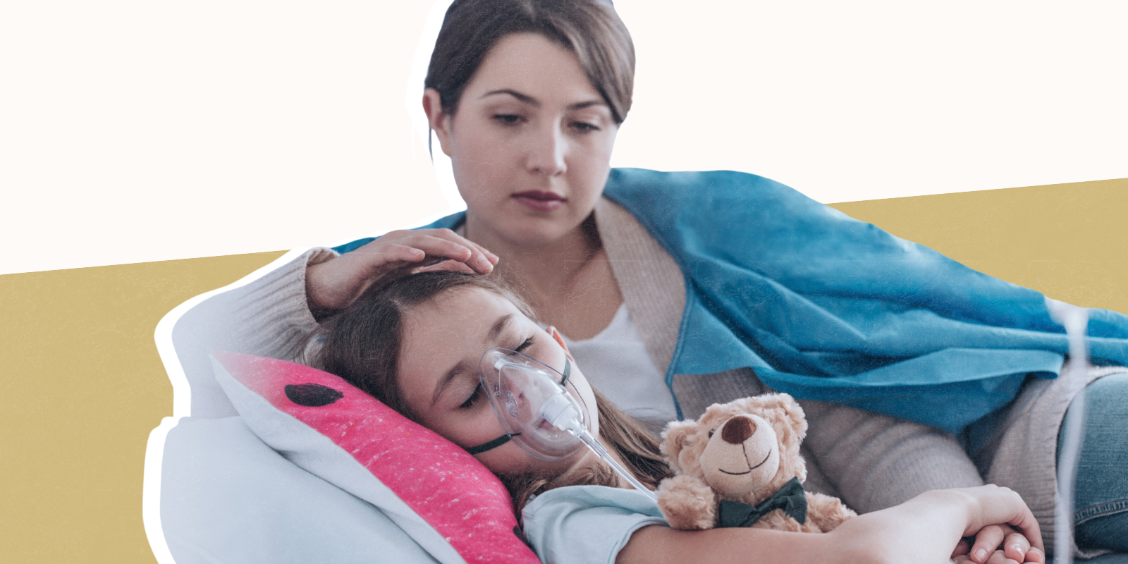 Photo of mother holding a child who being giving oxygen treatment 
