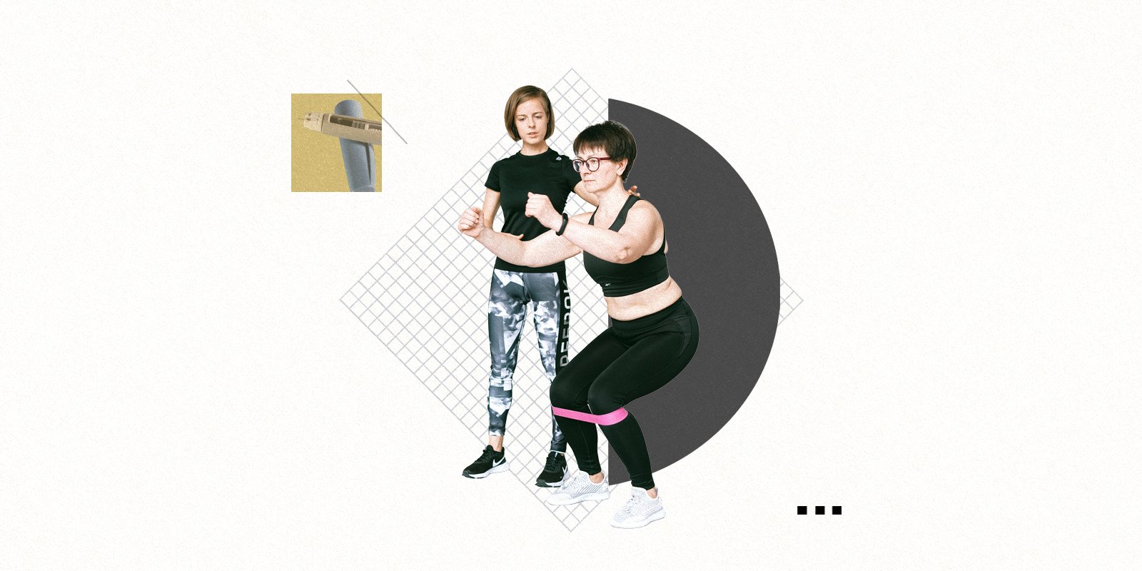 A person exercises as a trainer stands to their right. 