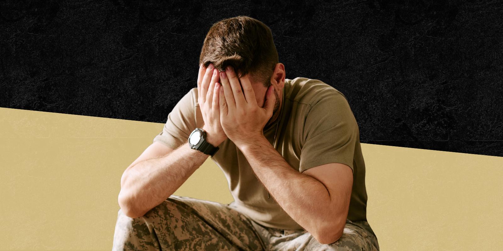 Photo of military veteran with his hands over his face looking stressed 
