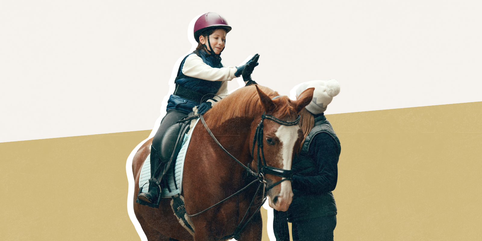 Child on a horse with instructor standing beside.