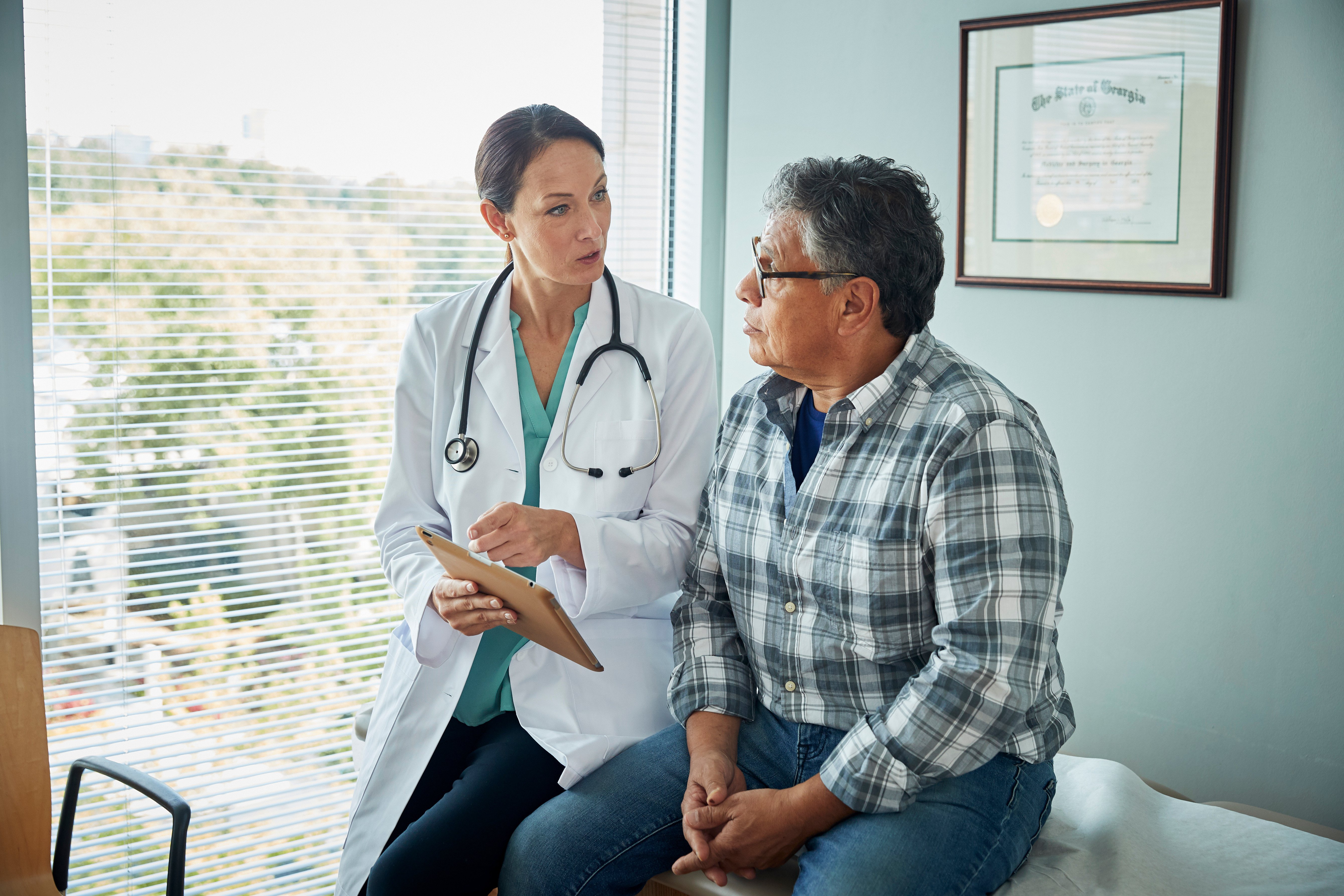 Doctor speaking to patient.