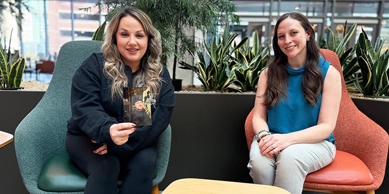 Amanda Killam, left, poses with a photo of her partner, Rob, and her therapist, Amanda Doria, MS, LPC