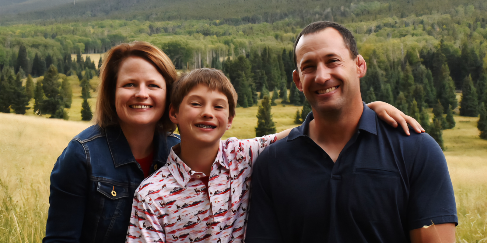 Ashley Absmeier-Koppenhafer with her husband, Travis, and son, Grant.