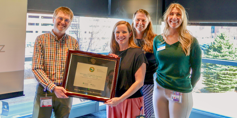 CTRC Core Lab team and Derek Cooper holding the lab's Green Lab Certificate