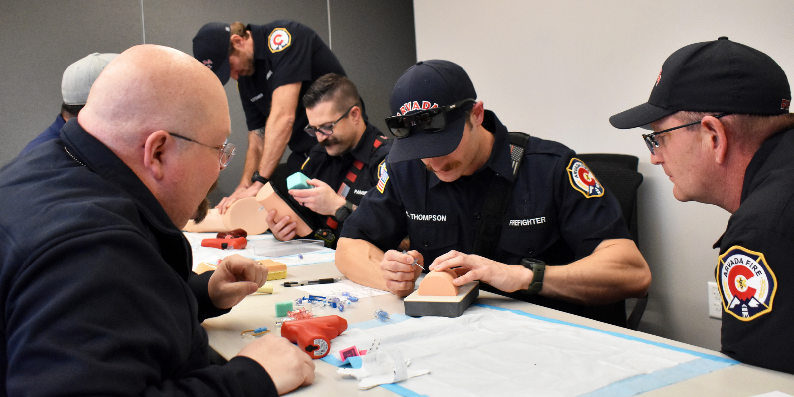 Arvada Fire personnel train for intraosseous infusion using COMPLETE-IO trainers. 