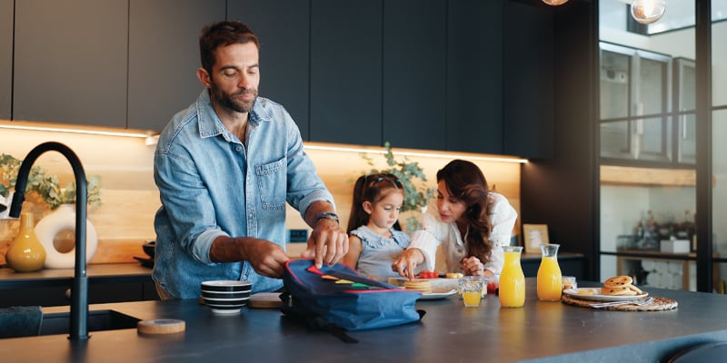 dad and mom with a child