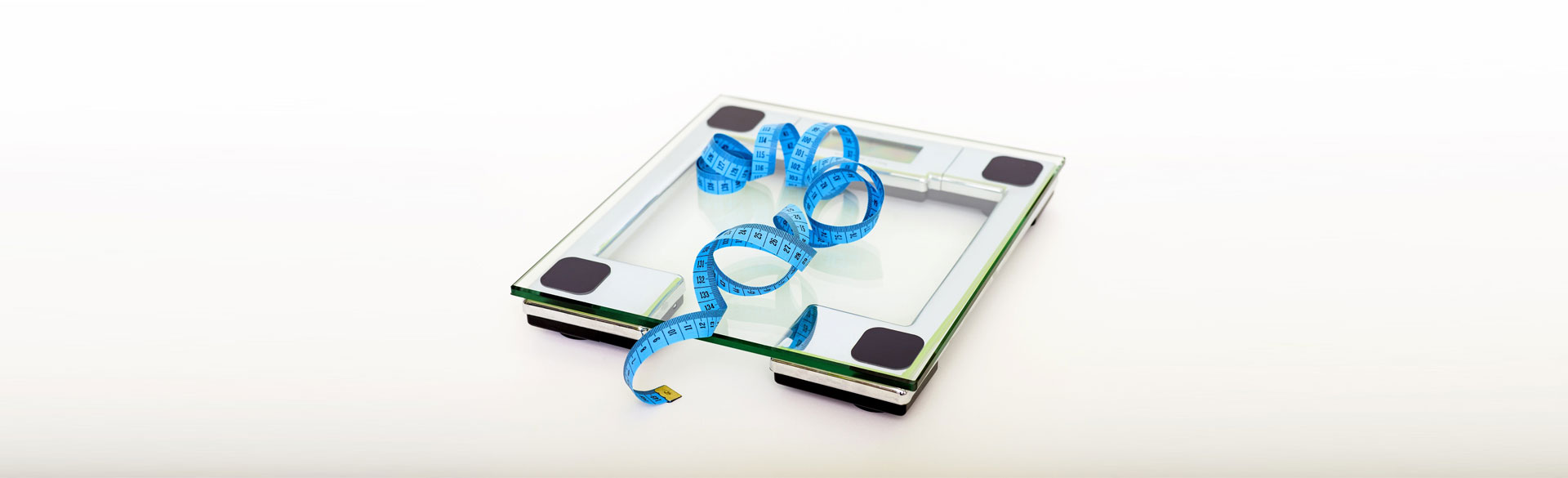 New Year/New You: Reflections on Nutrition and Exercise (Scale and Tape Measure)