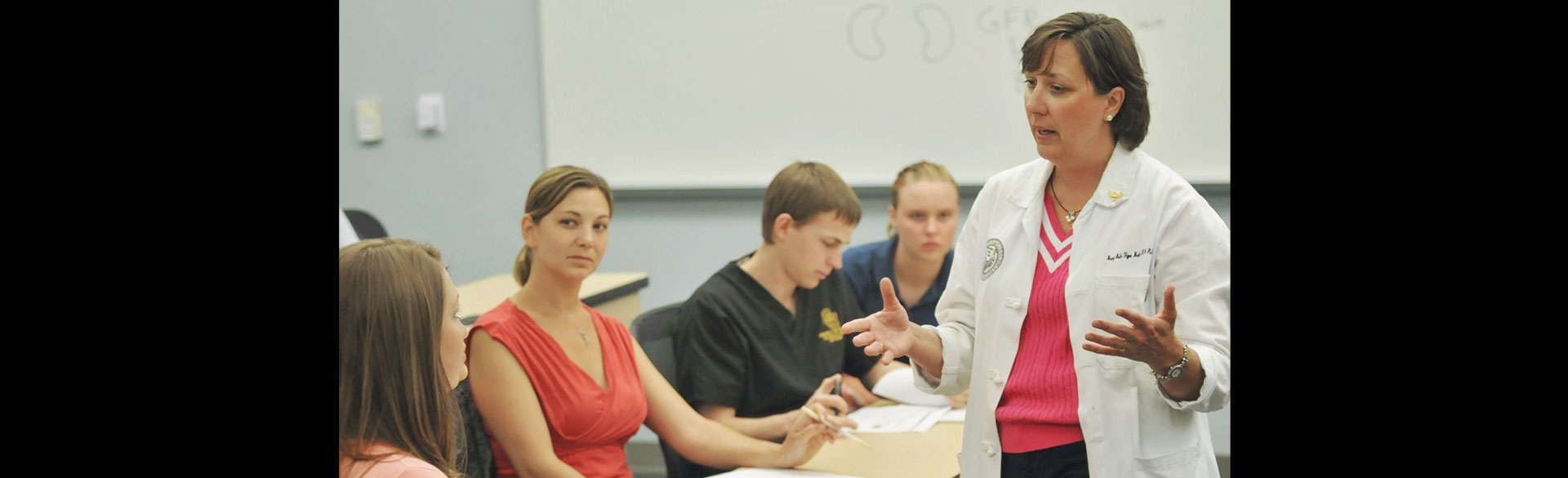 CU Nursing faculty teaching a class