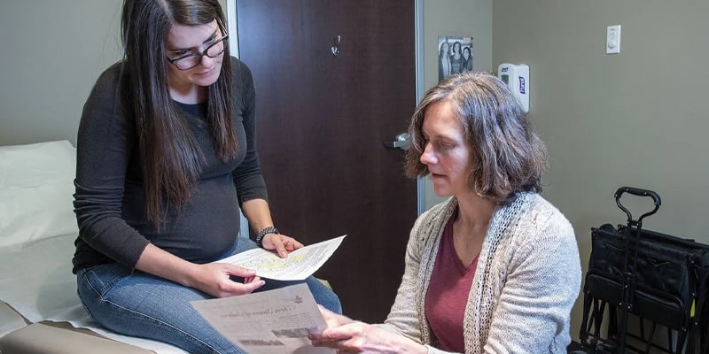 midwife with patient