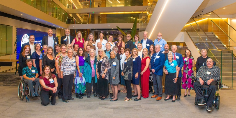 Nursing alumni stand together for a group photo