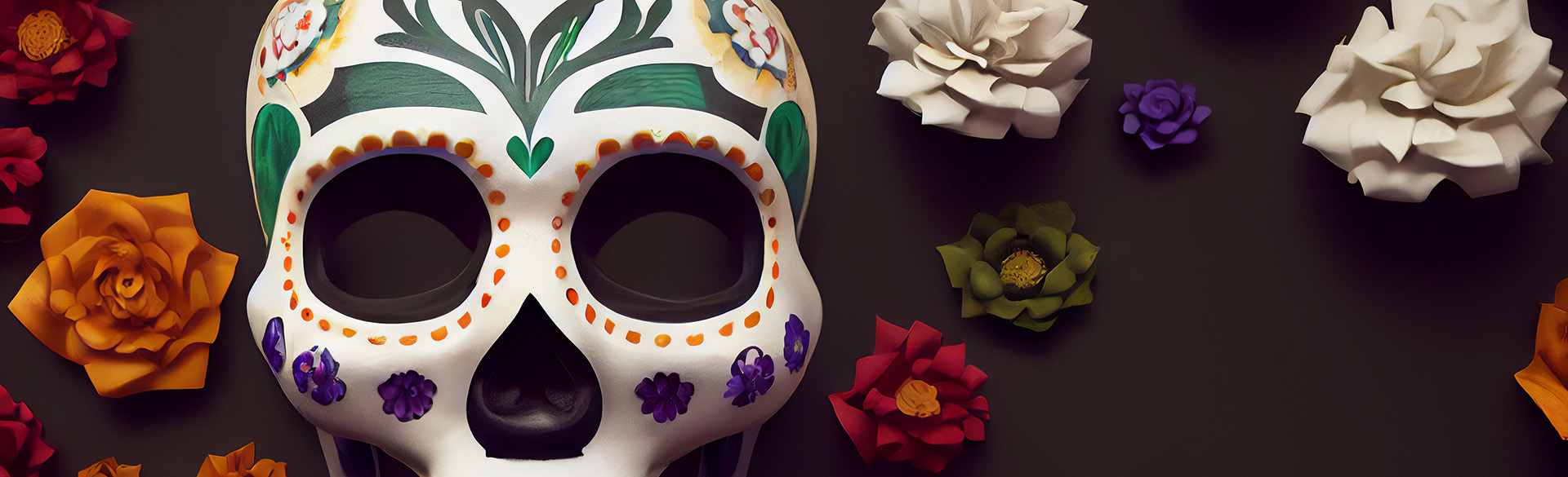 Decorated skull for Day of the Dead sits amid flowers