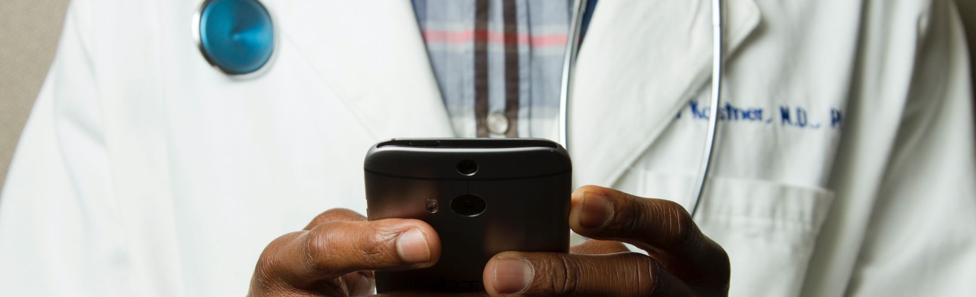 Doctor using cell phone