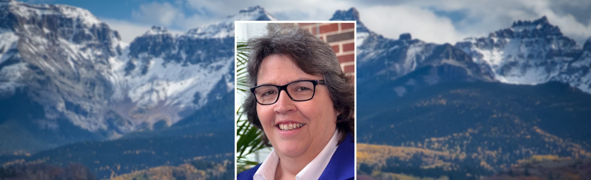 Dr. Laura Linnan with mountain background