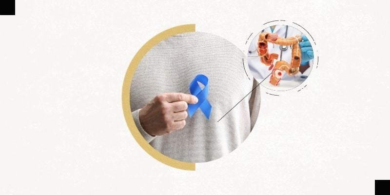 Man holding colorectal cancer rboon with bump out image of colorectal system