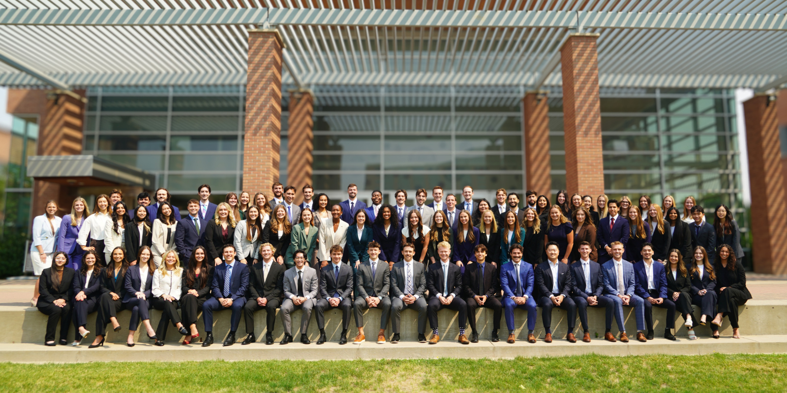 large group of dental students in business dress