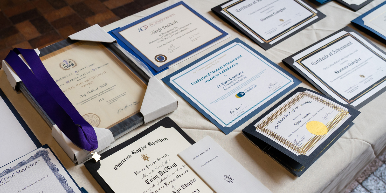 awards and certificates on table